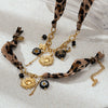 Wholesale Leopard Print Stainless Steel And Titanium Steel Electroplated Pendant Necklace And Accessories Set For Women