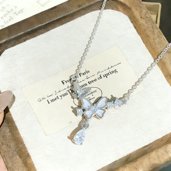 Wholesale Light Luxury Animal Zodiac Titanium Steel Oshaped Chain Necklace With Copper Zircon Inlaid Double Butterfly Tassel Water Drop Pendant For Women