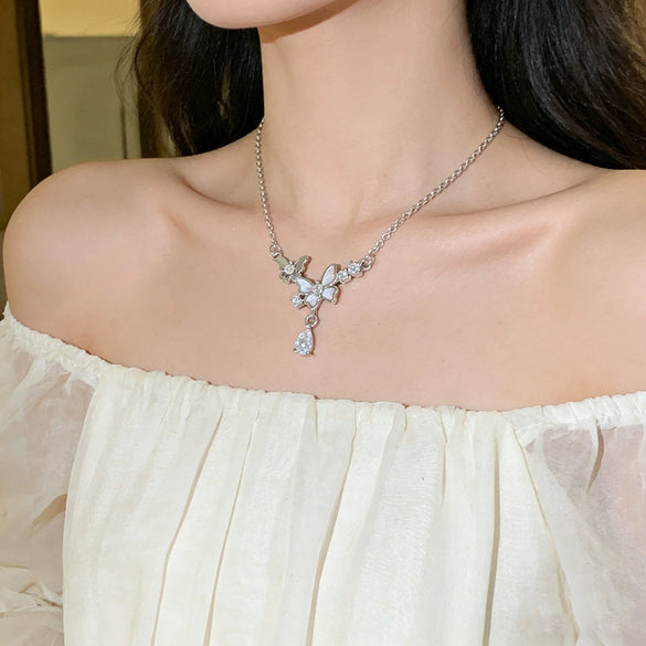 Wholesale Light Luxury Animal Zodiac Titanium Steel Oshaped Chain Necklace With Copper Zircon Inlaid Double Butterfly Tassel Water Drop Pendant For Women