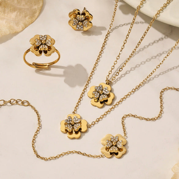 Wholesale Light Luxury Electroplated Stainless Steel Four Leaf Flower Inlaid Zircon Women's Jewelry Set With Necklace And Bracelet