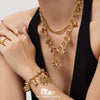 Wholesale Light Luxury Electroplated Stainless Steel Spiral Sun Bear Zircon Multipendant Necklace And Bracelet Set For Women
