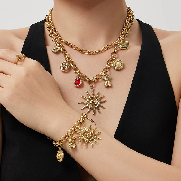 Wholesale Light Luxury Electroplated Stainless Steel Spiral Sun Bear Zircon Multipendant Necklace And Bracelet Set For Women