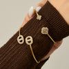 Wholesale Light Luxury Floral Geometric Open Thin Circle Bracelet Set Made Of 316L Ecofriendly Stainless Steel Inlaid With Rhinestones And Electroplated