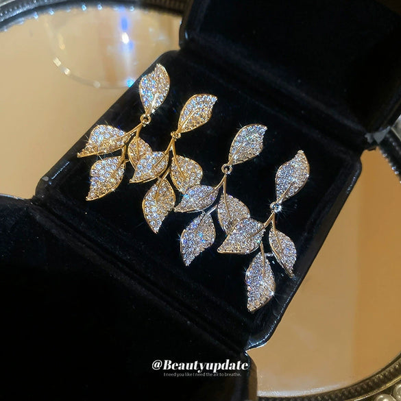 Wholesale Light Luxury French Retro Style Copper Leaf Zirconia Tassel Earrings For Women
