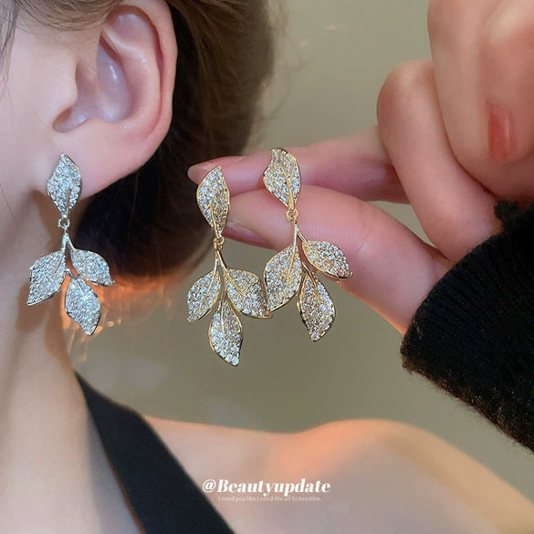 Wholesale Light Luxury French Retro Style Copper Leaf Zirconia Tassel Earrings For Women