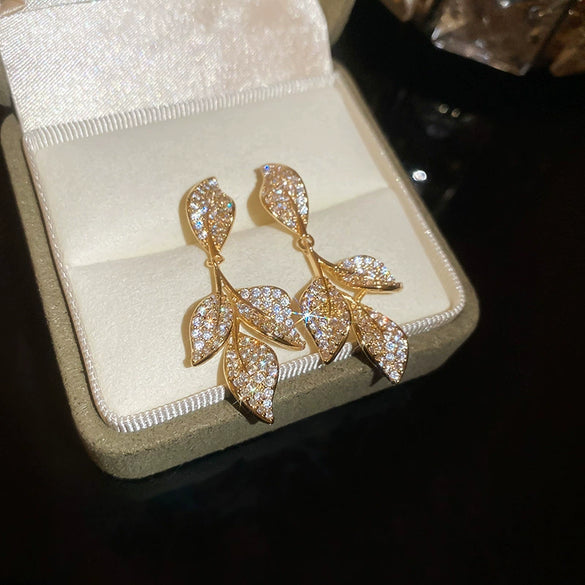 Wholesale Light Luxury French Retro Style Copper Leaf Zirconia Tassel Earrings For Women