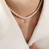 Wholesale Light Luxury Freshwater Pearl Necklace With Letter Pendant Titanium Steel Gold Plated Electroplated