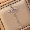 Wholesale Light Luxury Geometric Copper Zircon Inlaid Pendant Necklace With Movable Wings And Polished Plating For Couples