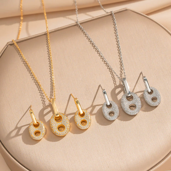 Wholesale Light Luxury Geometric Pig Nose Earrings And Necklaces Set Real Gold Electroplated With Diamonds Inlaid Titanium Steel And Environmentally Friendly Copper For Women