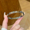 Wholesale Light Luxury Geometric Polish Titanium Steel Crossshaped Bracelet With 18K Goldplated Stainless Steel Clasp For Women
