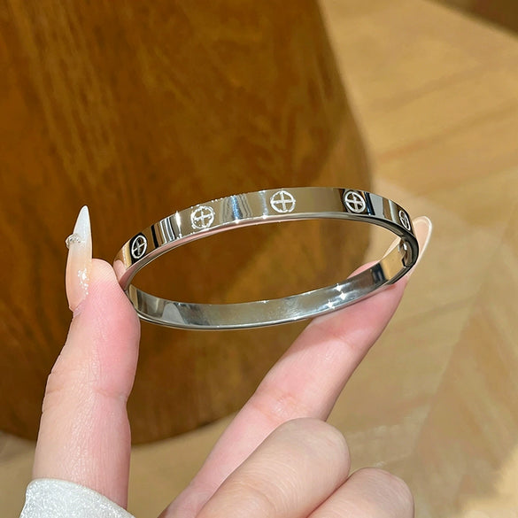 Wholesale Light Luxury Geometric Polish Titanium Steel Crossshaped Bracelet With 18K Goldplated Stainless Steel Clasp For Women