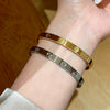 Wholesale Light Luxury Geometric Polish Titanium Steel Crossshaped Bracelet With 18K Goldplated Stainless Steel Clasp For Women