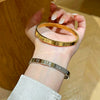 Wholesale Light Luxury Geometric Polish Titanium Steel Crossshaped Bracelet With 18K Goldplated Stainless Steel Clasp For Women