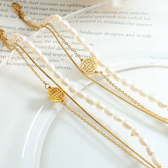 Wholesale Light Luxury Geometric 316L Stainless Steel And Freshwater Pearl Electroplating Bracelet For Women