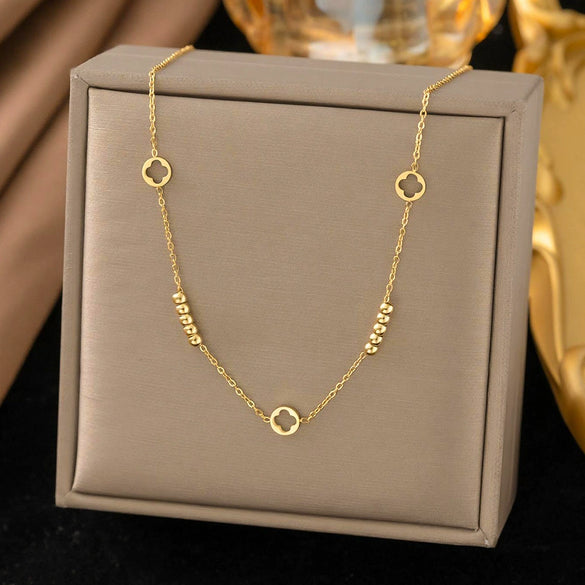 Wholesale Light Luxury Geometric Titanium Steel Real Gold Plated Hollow Flower Four Leaf Clover Necklace For Women