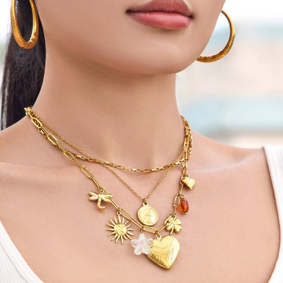 Wholesale Light Luxury Multielement Heart Pendant Necklace And Bracelet Set For Women 18K Goldplated Titanium Steel