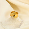 Wholesale Light Luxury Niche Simple Design Nonfading Unisex Ring In Stainless Steel With Wave Pattern And Vacuum Real Gold Pvd Treatment