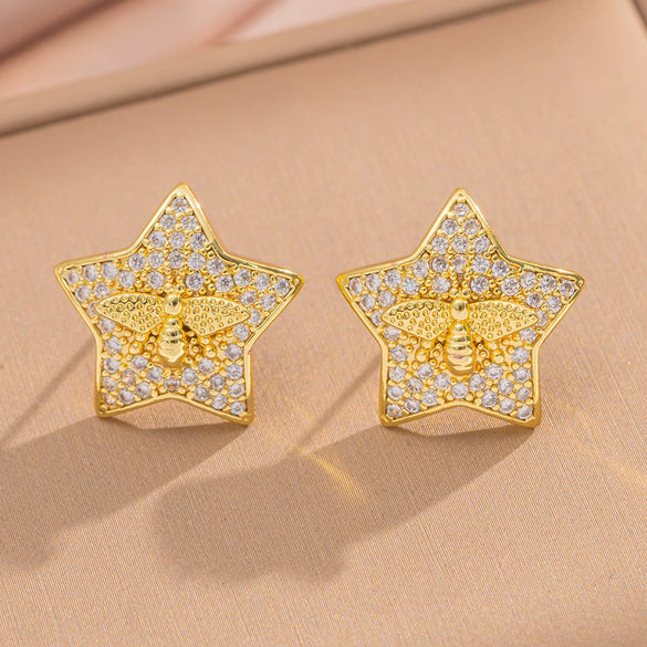 Wholesale Light Luxury Style Copper Star Earrings Plated With Real Gold