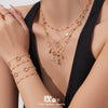 Wholesale Light Luxury Style Electroplated Stainless Steel Deer Bell Clover Multipendant Necklace Bracelet Jewelry Set For Women