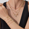 Wholesale Light Luxury Style Electroplated Stainless Steel Deer Bell Clover Multipendant Necklace Bracelet Jewelry Set For Women
