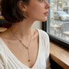 Wholesale Light Luxury Style 18K Gold Plated Stainless Steel And Titanium Steel Starburst Pendant Clavicle Necklace For Women
