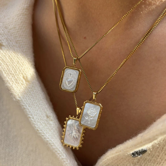Wholesale Light Luxury Style Stainless Steel Pendant Necklace With White Shell Inlay Embossed Polar Star Flower And Heart Pattern For Women