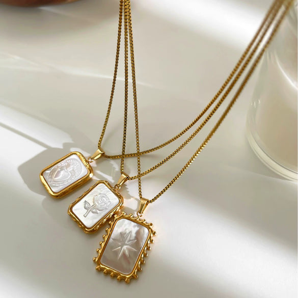 Wholesale Light Luxury Style Stainless Steel Pendant Necklace With White Shell Inlay Embossed Polar Star Flower And Heart Pattern For Women