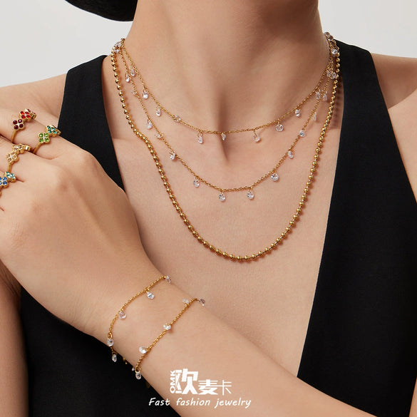 Wholesale Light Luxury Tassel Design 5A Zircon Stainless Steel 18K Gold Plated Collarbone Necklace And Bracelet Set For Women