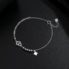 Wholesale Light Luxury Women's S925 Sterling Silver Fourleaf Clover Irregular Bracelet With Tassel And Flower Design Electroplated