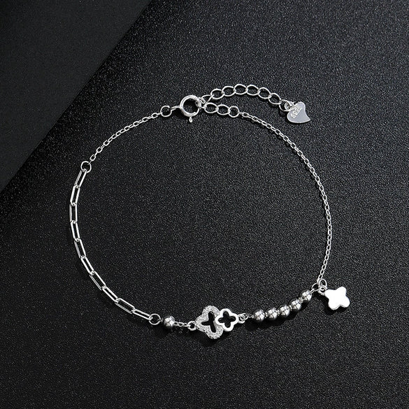 Wholesale Light Luxury Women's S925 Sterling Silver Fourleaf Clover Irregular Bracelet With Tassel And Flower Design Electroplated