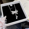 Wholesale Light Luxury Women's Tassel Bow Necklace With Flower Pattern Titanium Steel Oshaped Chain And Copper Zircon Inlaid Pendant