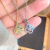 Wholesale Light Luxury Women's Titanium Steel Necklace With Zircon Inlaid Fourleaf Flower Pendant And Water Wave Chain