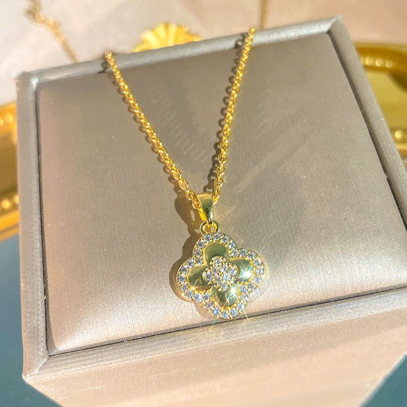Wholesale Light Luxury Women's Titanium Steel Necklace With Zircon Inlaid Fourleaf Flower Pendant And Water Wave Chain