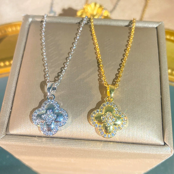 Wholesale Light Luxury Women's Titanium Steel Necklace With Zircon Inlaid Fourleaf Flower Pendant And Water Wave Chain