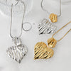 Wholesale Love Heart Shaped Exaggerated Irregular Pleated Stainless Steel Earrings And Necklace Jewelry Suit With Gold And Silver Color Matching And Electroplating Treatment