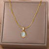 Wholesale Luxury Oval Titanium Steel Necklace With Cat's Eye Pendant Electroplated For Women