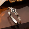 Wholesale Luxury White Shellfish Fourleaf Clover Hollow Titanium Steel Electroplated Bracelet