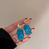 Wholesale Metal Blue Irregular Earrings With Silver Needle Pleated And Geometric Design Electroplated For Women
