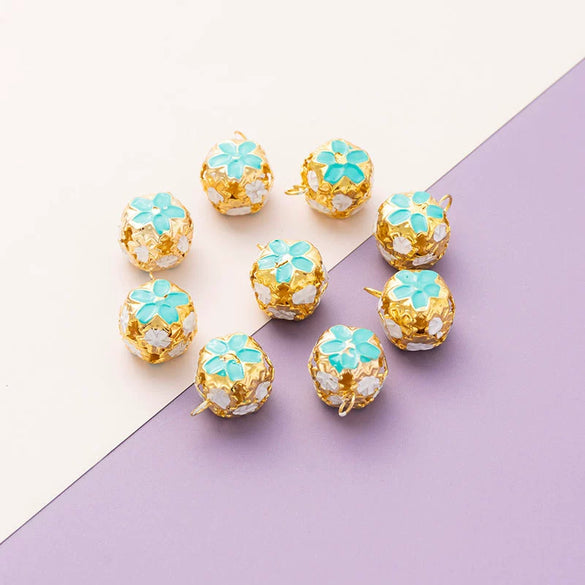 Wholesale Metal Bracelet With Color Hollow Flower Ball And Pet Bell Cloisonne And Electroplated Design