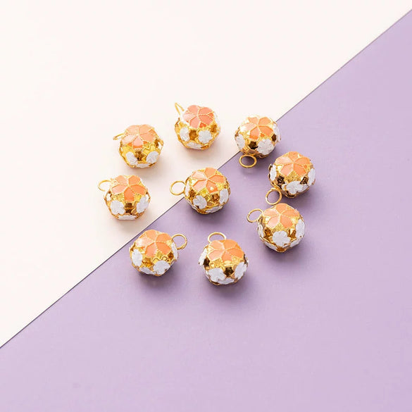 Wholesale Metal Bracelet With Color Hollow Flower Ball And Pet Bell Cloisonne And Electroplated Design