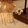 Wholesale Metal Copper Geometric And Flower Hollow Earrings Electroplated Light Luxury Style For Women