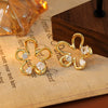 Wholesale Metal Copper Geometric And Flower Hollow Earrings Electroplated Light Luxury Style For Women