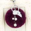 Wholesale Metal Flower Keychain Pendant For Female Plush And Cute Design