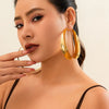 Wholesale Metal Geometric Hollow Exaggerated Women's Earrings With Electroplating