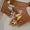 Wholesale Metal Imitation Pearl Flower Animal Zodiac Geometric Butterfly Finger Ring With Electroplating