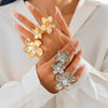 Wholesale Metal Imitation Pearl Flower Animal Zodiac Geometric Butterfly Finger Ring With Electroplating