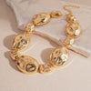 Wholesale Metal Oval Earrings And Necklace Set With Cross Crown Roman Numerals Pattern For Women Electroplated Light Luxury Style Clavicle Chain