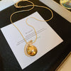 Wholesale Metal Oval Earrings And Necklace Set With Cross Crown Roman Numerals Pattern For Women Electroplated Light Luxury Style Clavicle Chain