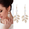Wholesale Metal Pearl Leaf Earrings Electroplated For Women Simple Geometric Style