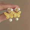 Wholesale Metallic Butterfly Pearl Earrings Zinc Alloy Animal Pattern Electroplating Light Luxury Style For Women